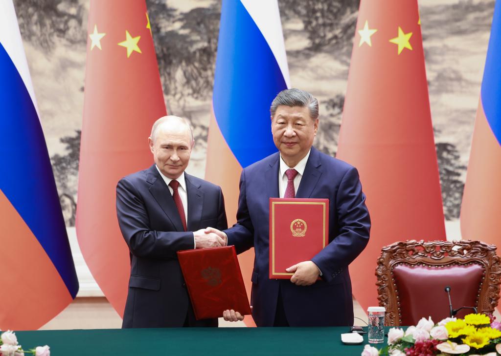 Presiden Tiongkok Xi Jinping Dan Presiden Rusia Vladimir Putin Menyaksikan Penandatanganan 20 Dokumen Kerja Sama